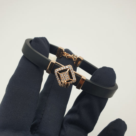 BRACELET IN A SILICON BELT WITH CZ SETTING SQUARE WITH BUTTERFLY CUBE AND SS LOCK