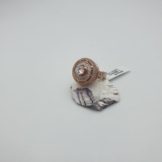 PRINCESS SPINNER CZ AND BAGUETTE DIAMOND SETTING WITH SOLITAIRE RING IN A ROSE GOLD