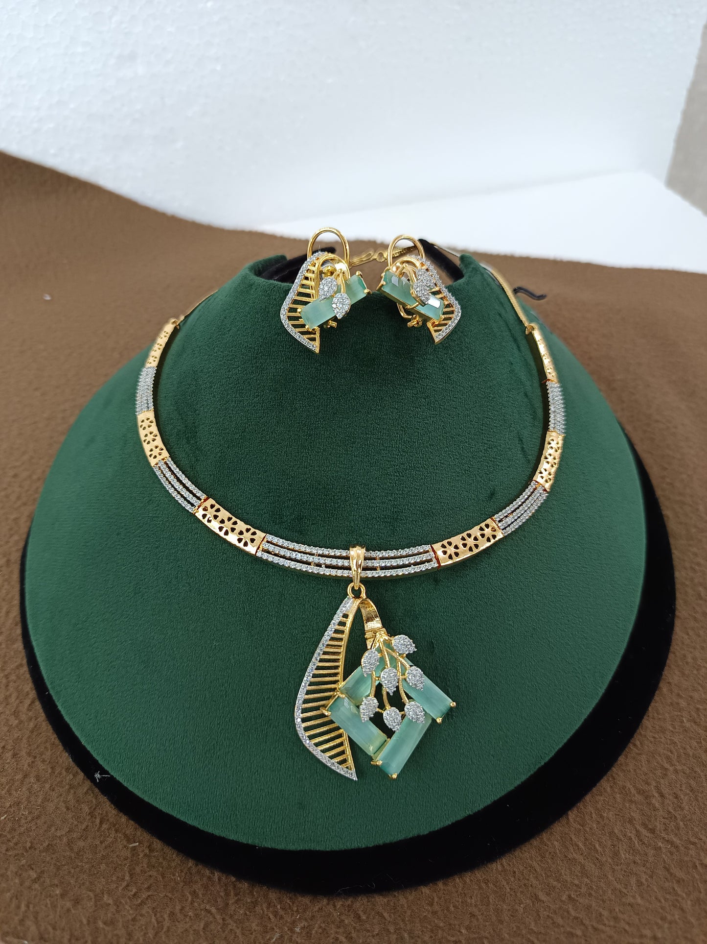 Mint Charm – Gold & Rhodium-Plated Slider Pendant Set with American Diamonds & Mint Green Accents