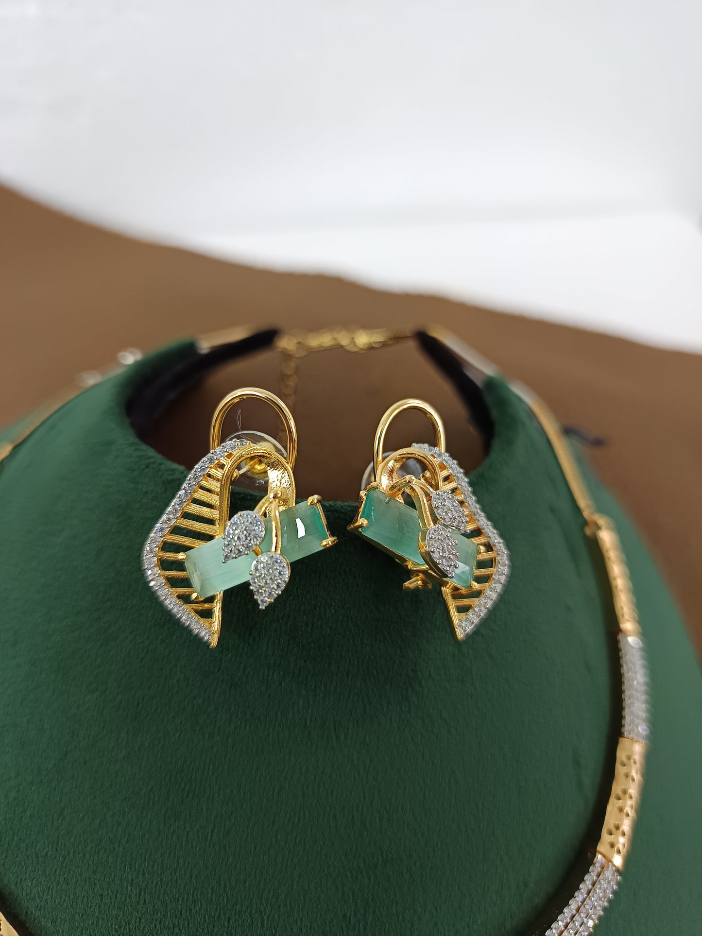 Mint Charm – Gold & Rhodium-Plated Slider Pendant Set with American Diamonds & Mint Green Accents