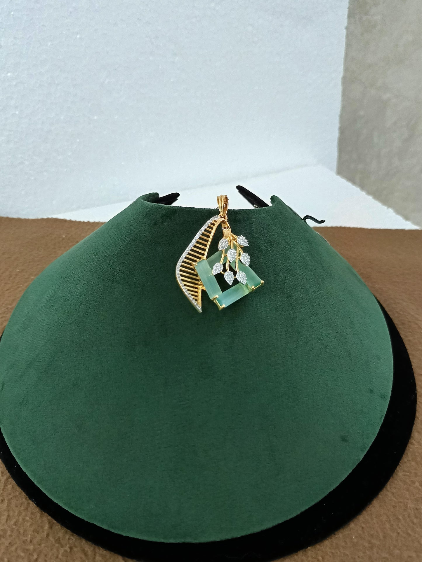 Mint Charm – Gold & Rhodium-Plated Slider Pendant Set with American Diamonds & Mint Green Accents
