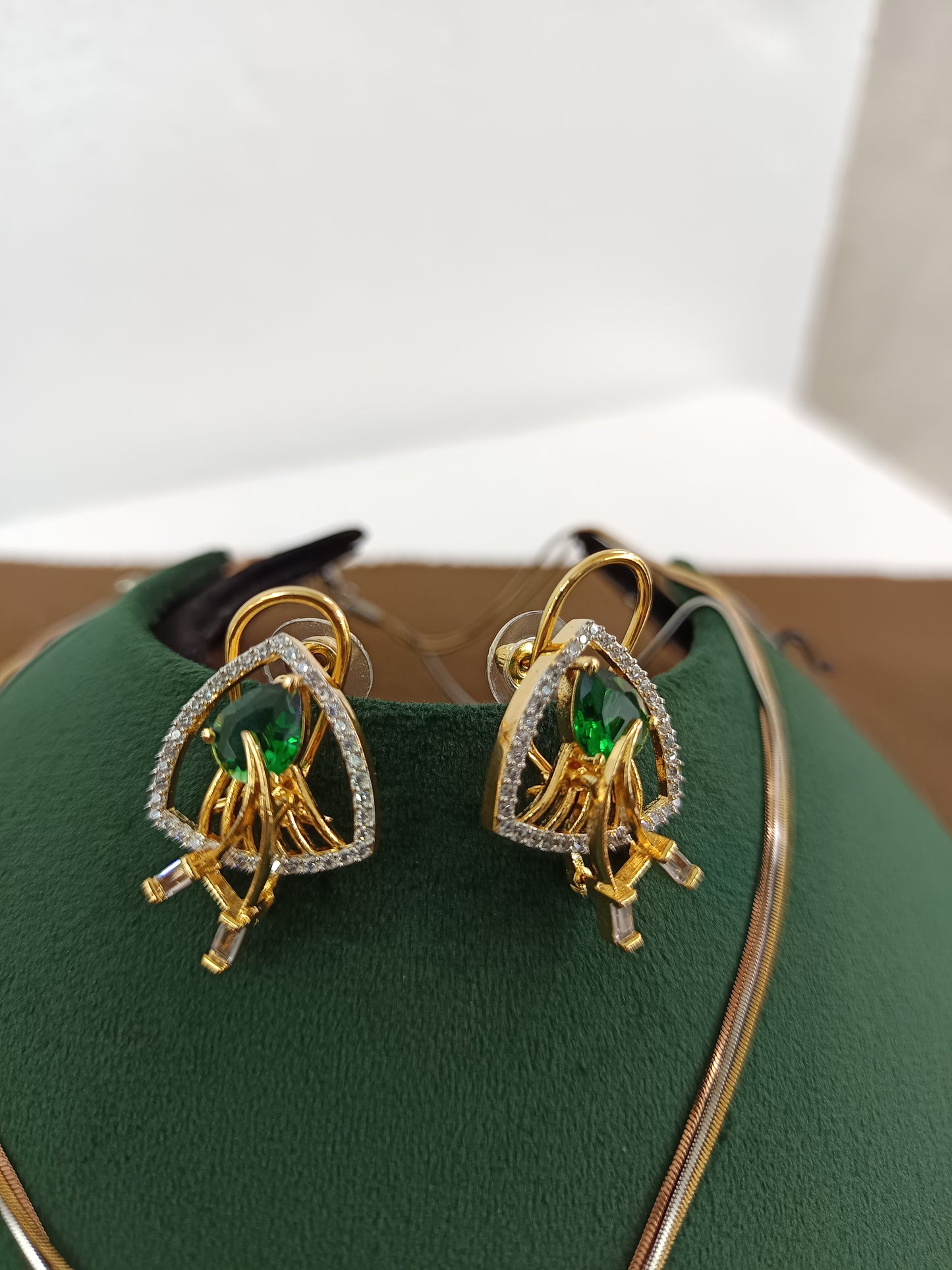 Emerald Teardrop Elegance – Gold & Rhodium Plated American Diamond Pendant Set