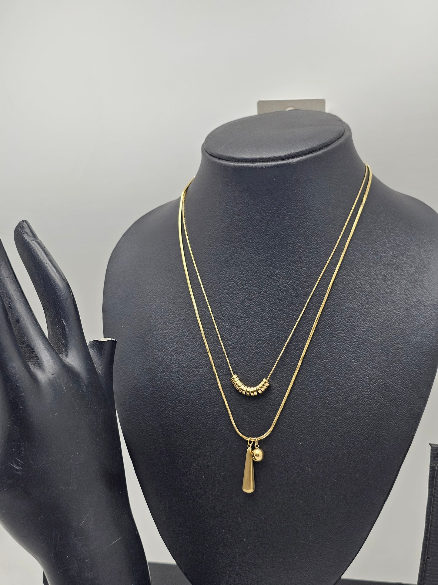 Gold Tone Layered Necklace With Ring Bead Strand