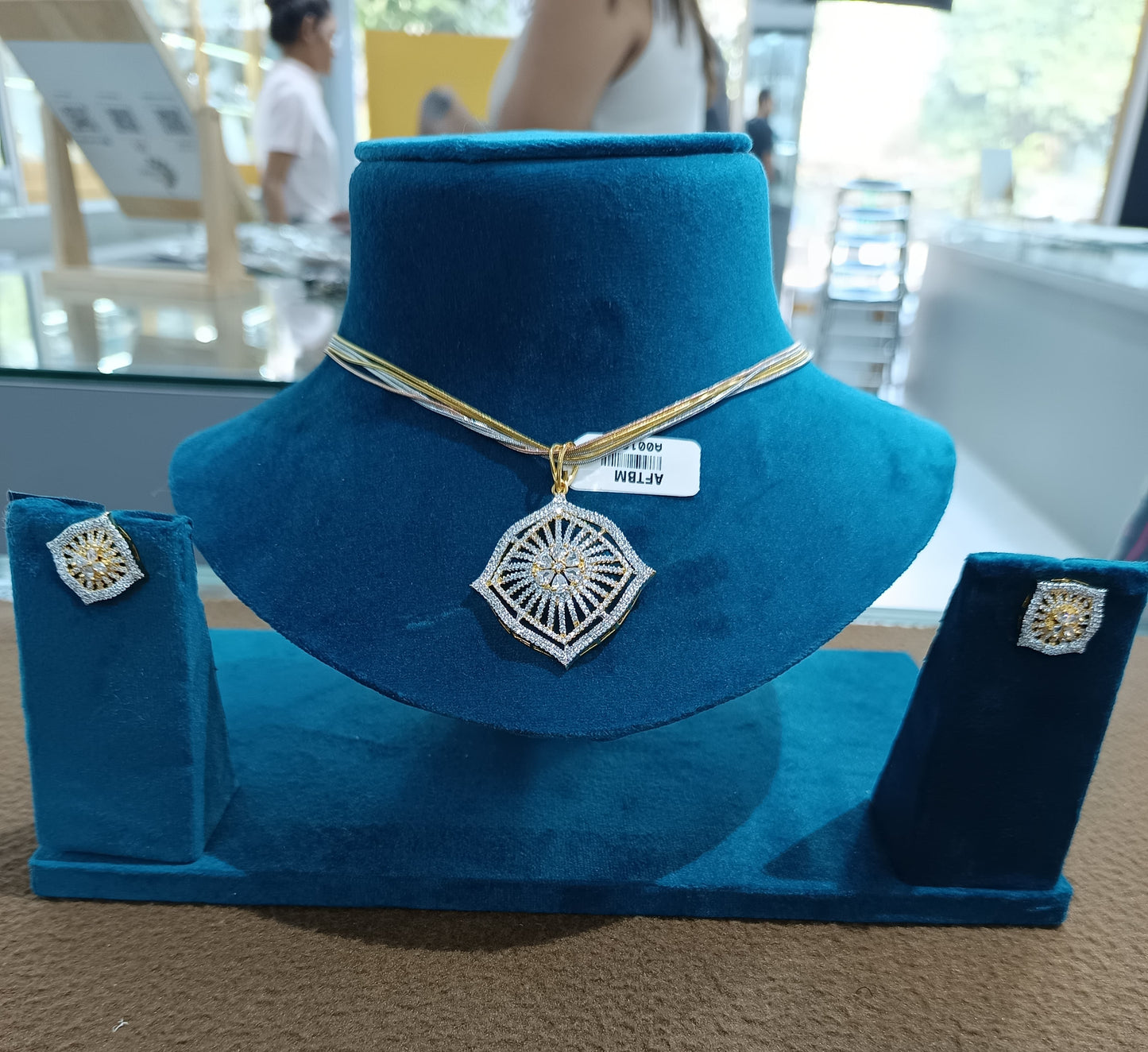 Golden chakra pendent set with 3 layer chain