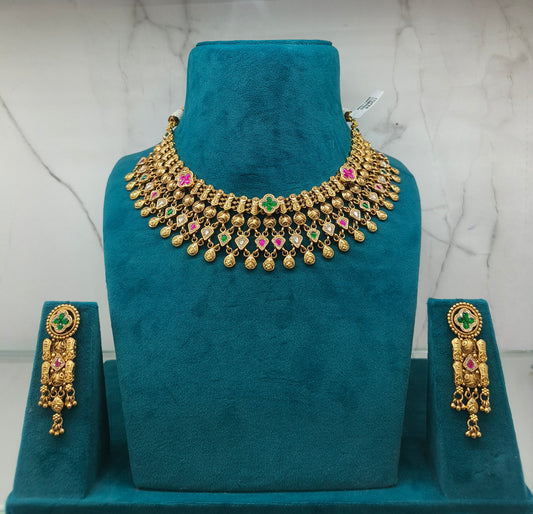 Gold necklace with colorful stones