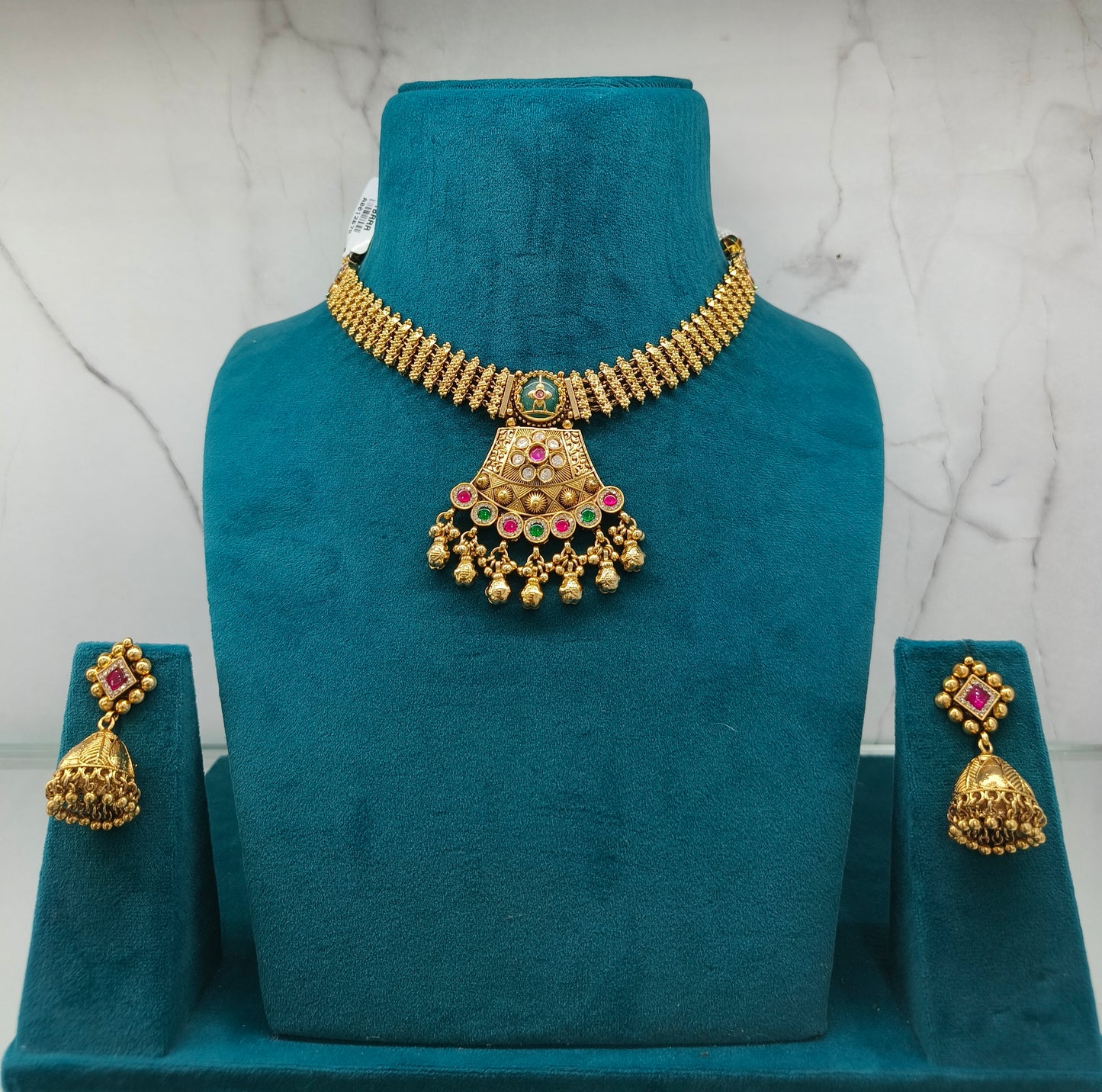 Gold necklace and earrings set