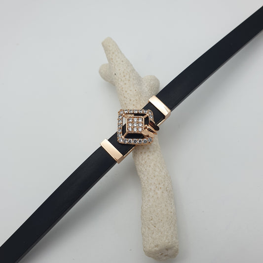 BRACELET IN A SILICON BELT WITH CZ SETTING SQUARE WITH BUTTERFLY CUBE AND SS LOCK