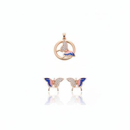 Butterfly-shaped jewelry set on a hand with a visible brand tag.