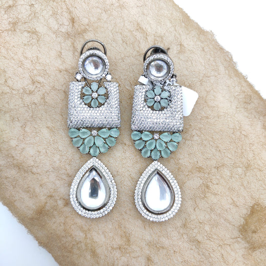 CHARCOAL PLATED EARRING IN CZ DIAMOND AND MINT STONE FLOWER WITH SILVER FOIL KUNDAN