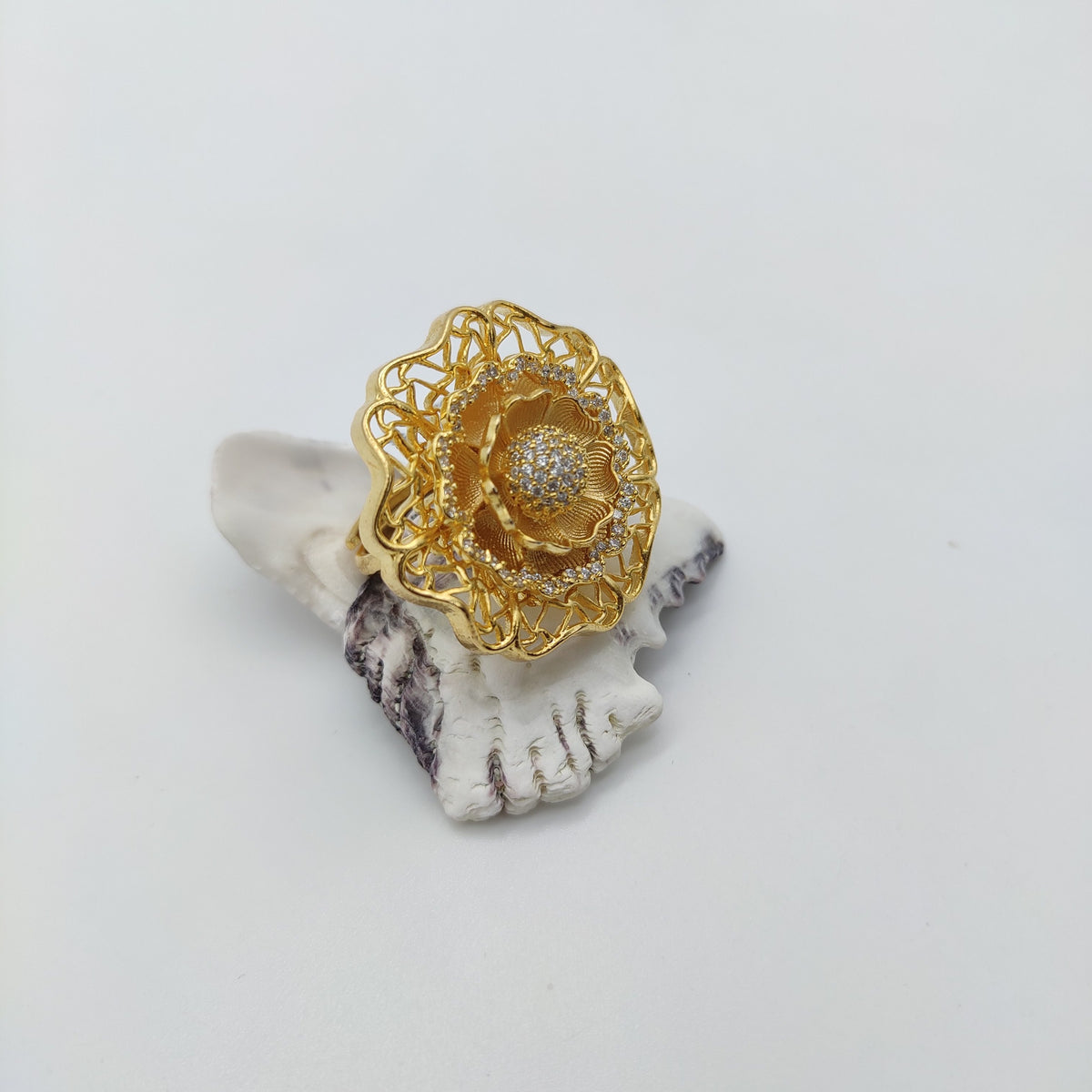 GOLD PLATED RING WITH 3D FLOWER SHAPE AND CZ DIAMOND SETTING