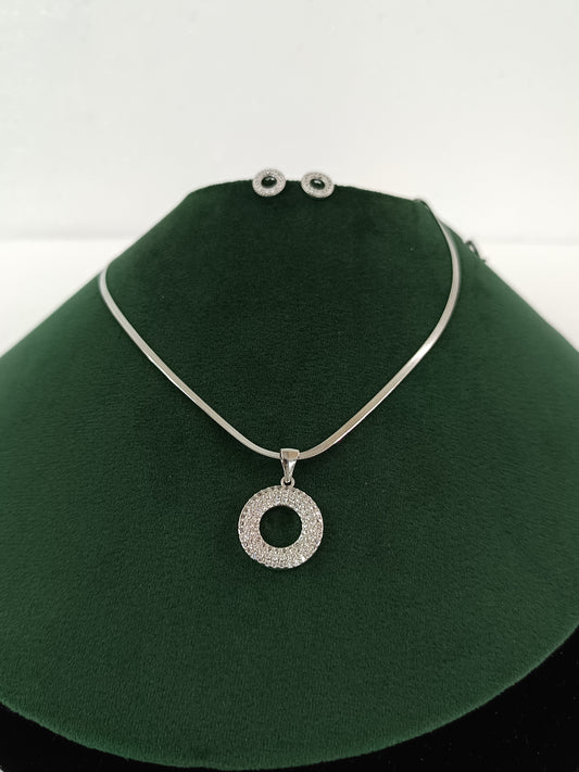 "Silver Moon Glow: American Diamond Circle Necklace Set"