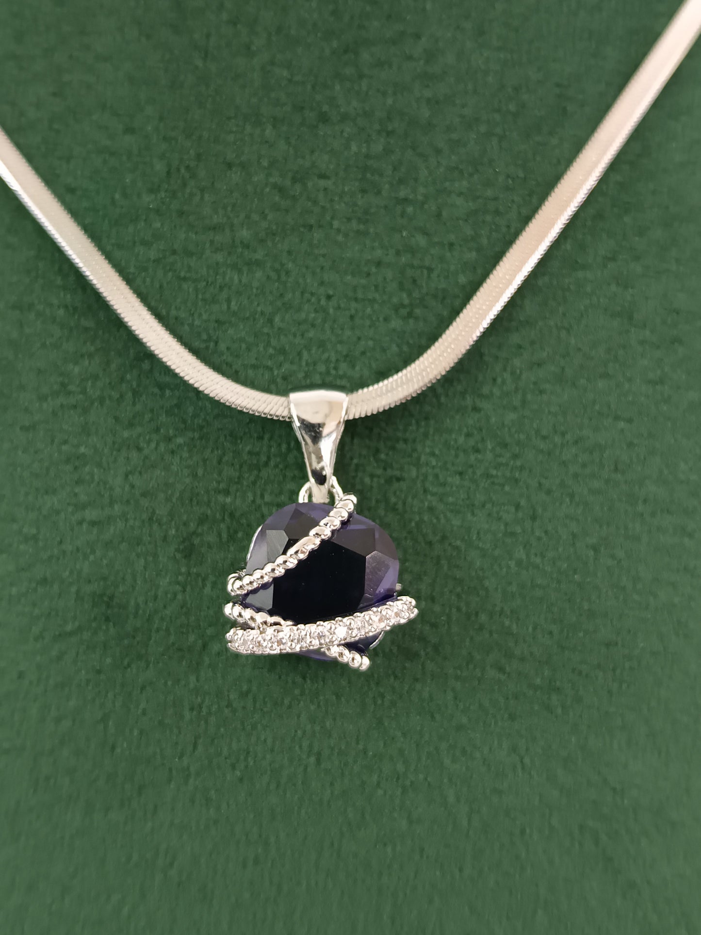 "Silver Serenity: American Blue Dazzle Diamond Pendant Set"