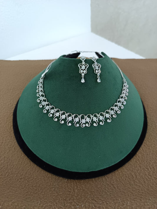 "Rhodium Brilliance: American Diamond Swirl Necklace Set"