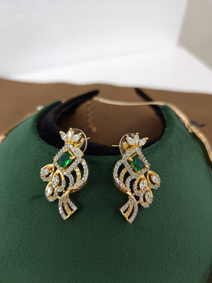 Peacock Elegance – Gold & Rhodium-Plated American Diamond Pendant Set with Green Stone Accent