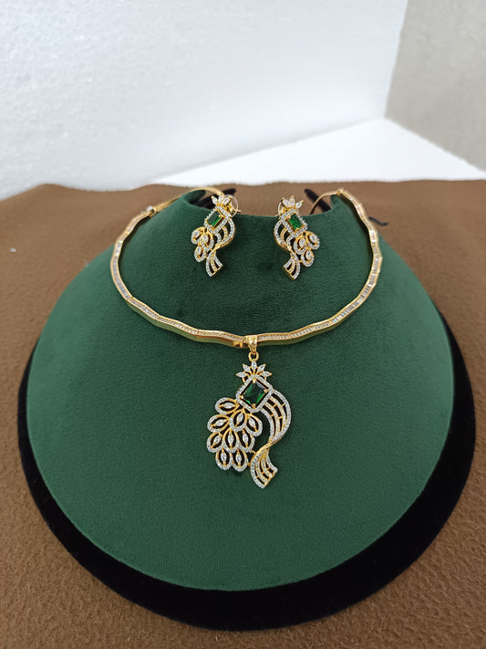 Peacock Elegance – Gold & Rhodium-Plated American Diamond Pendant Set with Green Stone Accent