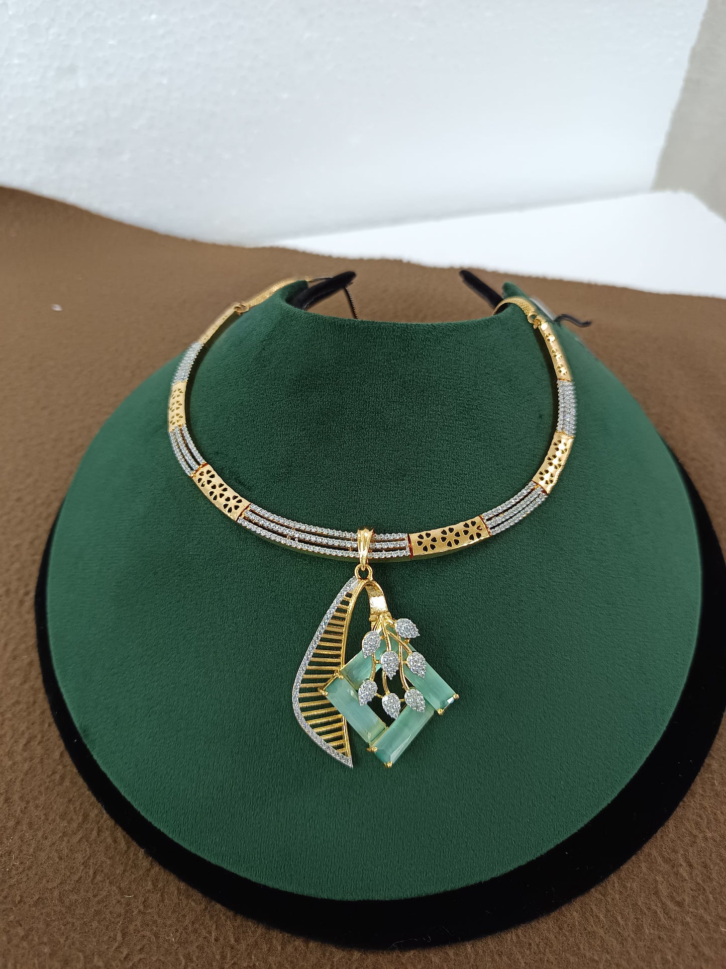 Mint Charm – Gold & Rhodium-Plated Slider Pendant Set with American Diamonds & Mint Green Accents