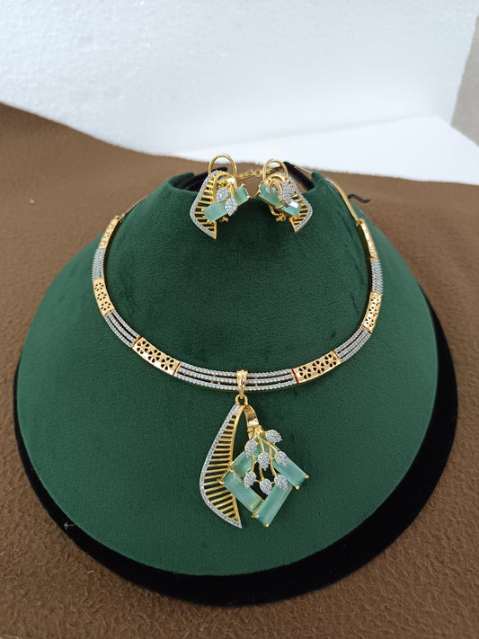 Mint Charm – Gold & Rhodium-Plated Slider Pendant Set with American Diamonds & Mint Green Accents