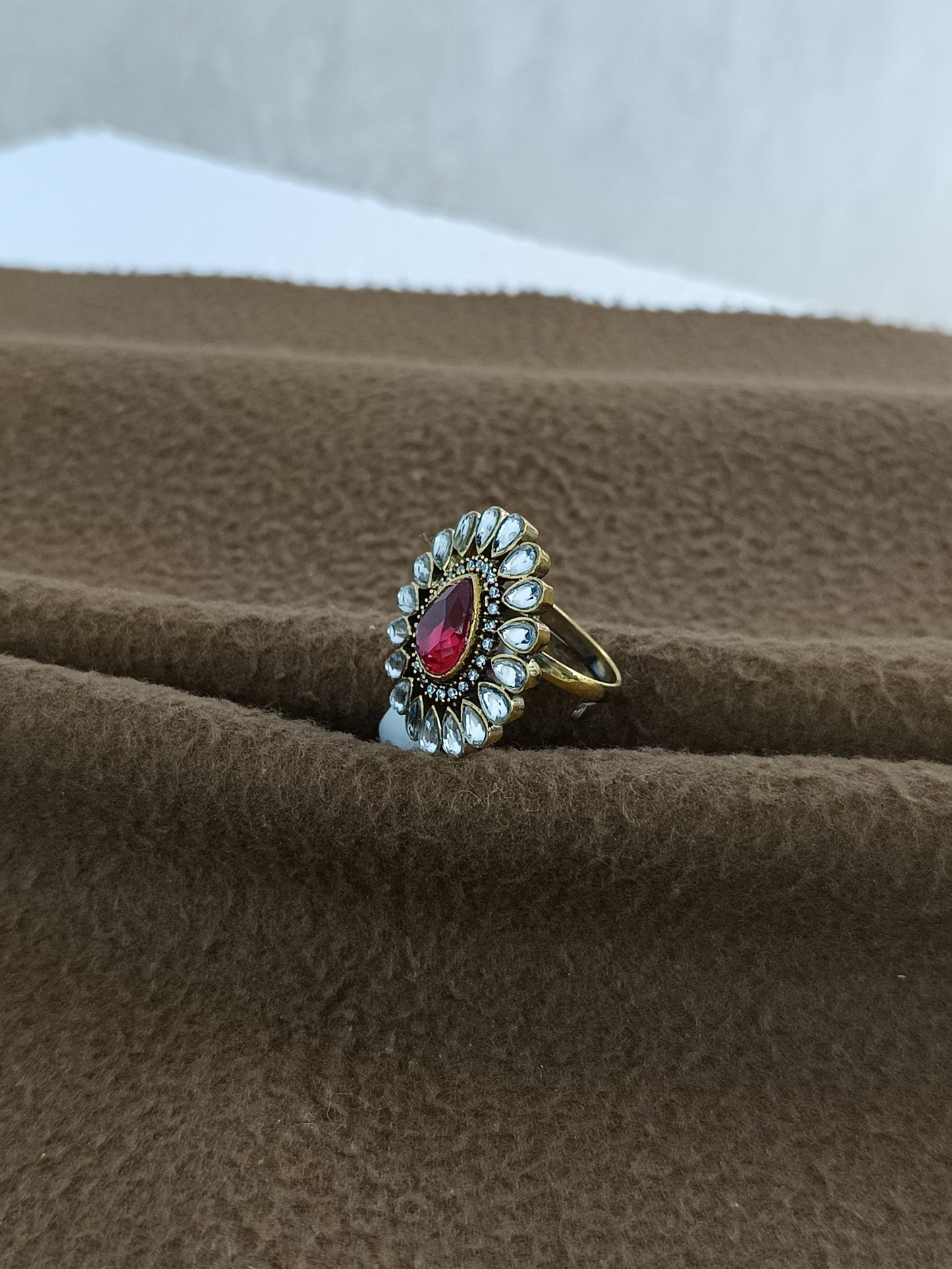 Royal Bloom – Antique Gold Plated Kundan Adjustable Ring with Pear-Shaped Color Stone