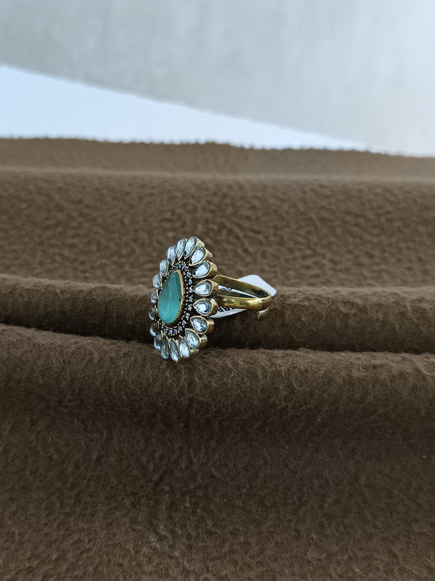 Royal Bloom – Antique Gold Plated Kundan Adjustable Ring with Pear-Shaped Color Stone