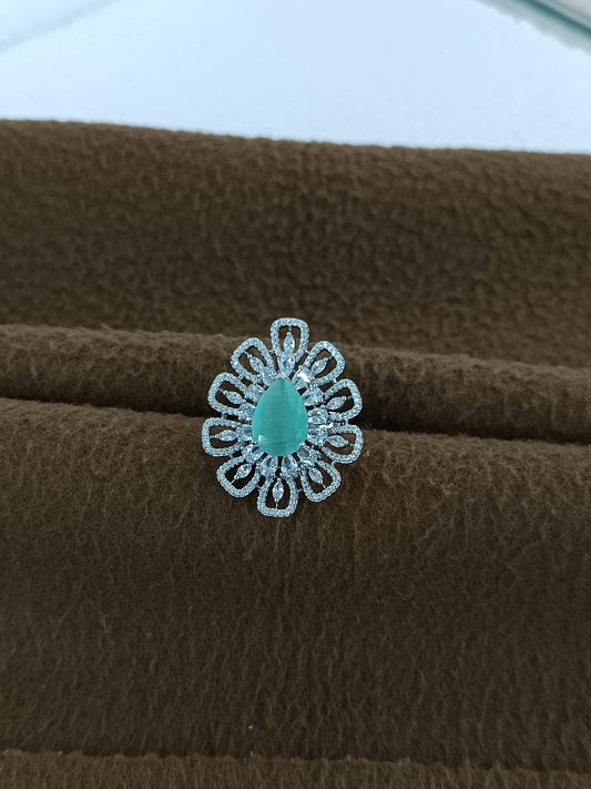"Radiant Bloom – Premium Platinum-Plated AD Finger Ring with Pear-Cut Center Gemstone"