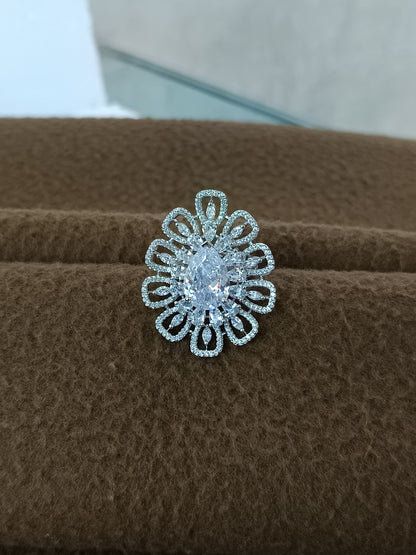 "Radiant Bloom – Premium Platinum-Plated AD Finger Ring with Pear-Cut Center Gemstone"