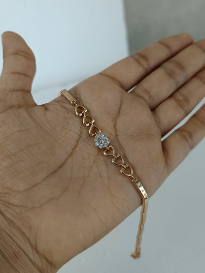 Gilded Grace – AD Studded Caret Gold Plated Bracelet