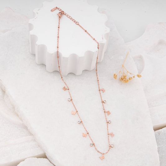 rose gold plated hanging round diamond and butterfly necklace