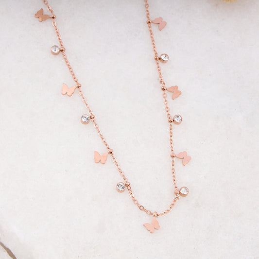 rose gold plated hanging round diamond and butterfly necklace