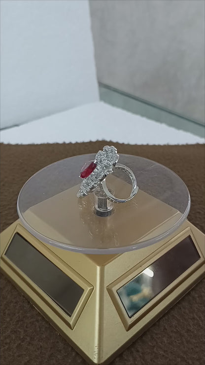 "Radiant Bloom – Premium Platinum-Plated AD Finger Ring with Pear-Cut Center Gemstone"