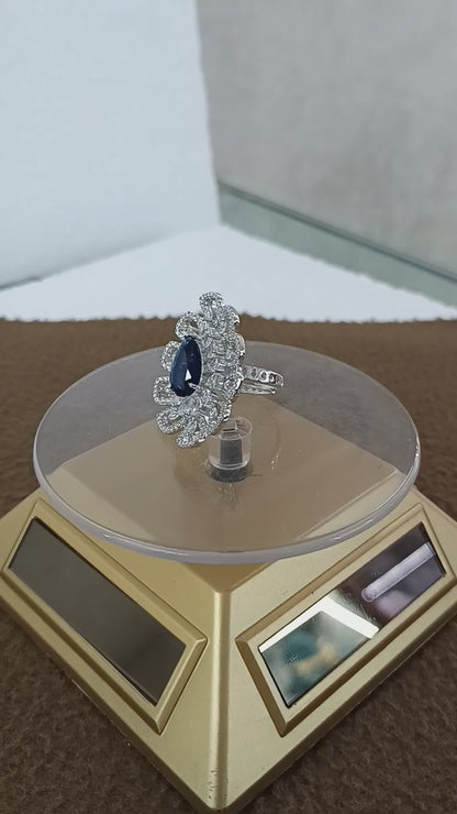 "Radiant Bloom – Premium Platinum-Plated AD Finger Ring with Pear-Cut Center Gemstone"