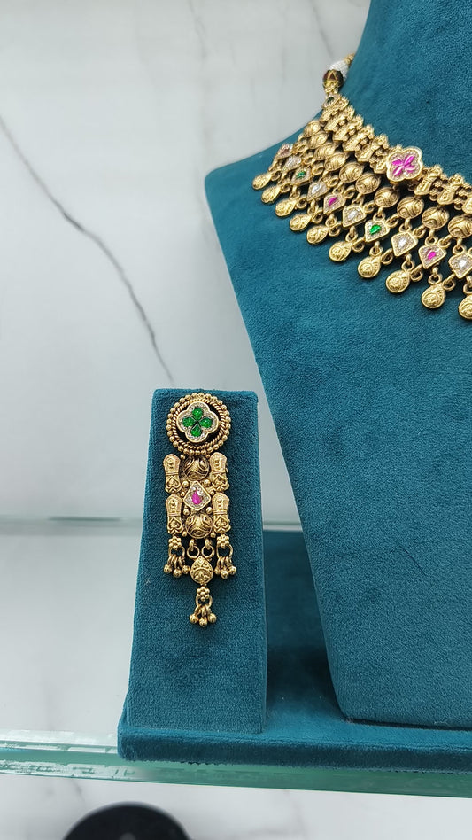 Gold necklace with colorful stones