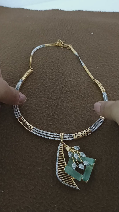 Mint Charm – Gold & Rhodium-Plated Slider Pendant Set with American Diamonds & Mint Green Accents