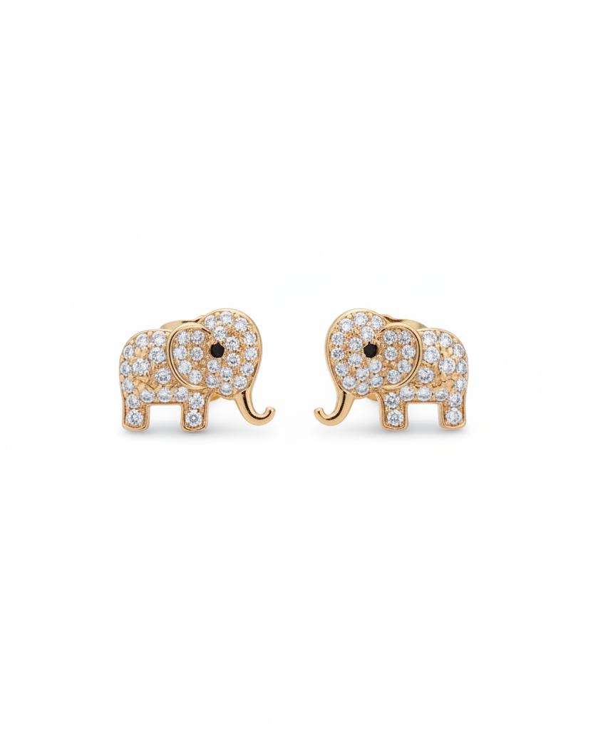 A pair of gold-plated elephant stud earrings fully encrusted with brilliant white cubic zirconia stones, displayed beautifully on a black fabric background.