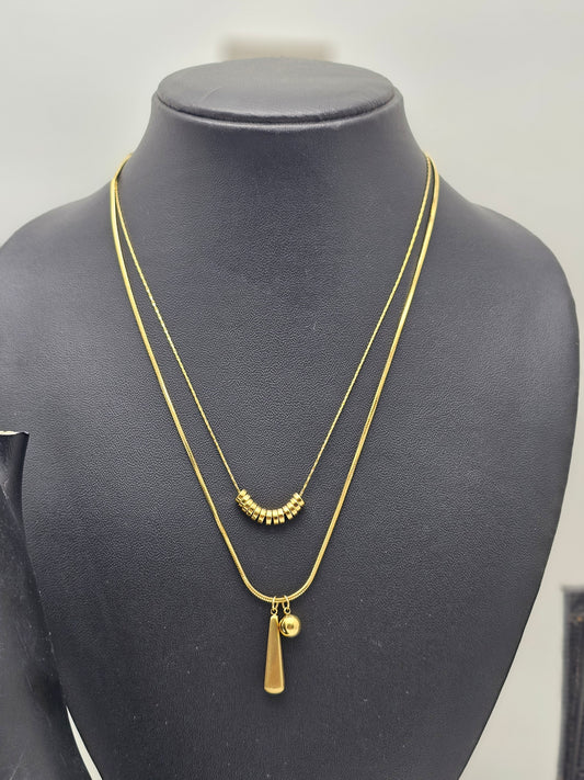Gold Tone Layered Necklace With Ring Bead Strand