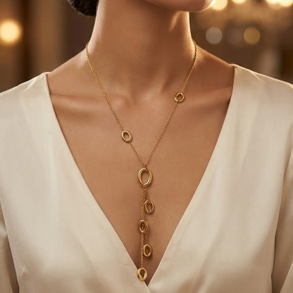 Gold Toned Necklace with Interlocking ring pendent